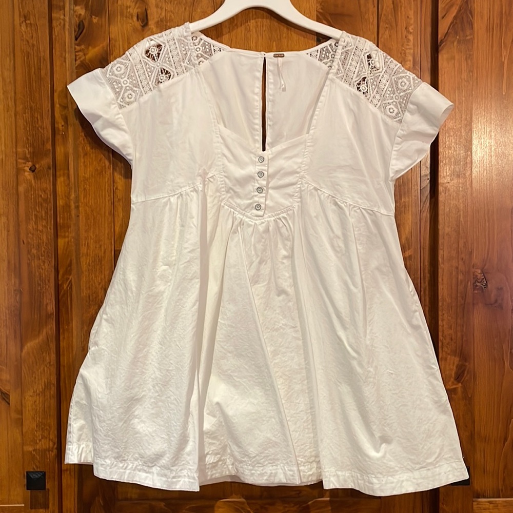 Free People white cotton mini romper with lace details size XS never worn